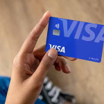 person-holding-card-in-hand-800x