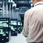 Repairman running code in data center