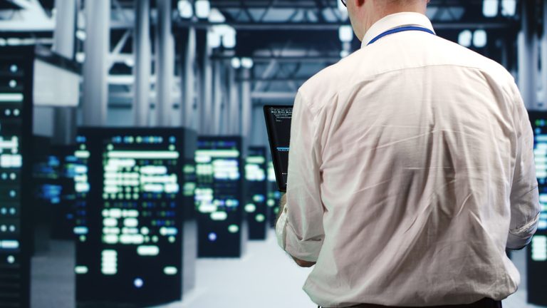 Repairman running code in data center