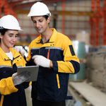 Hispanic,Industrial,Engineers,In,White,Helmet,And,Safety,Jacket,Work