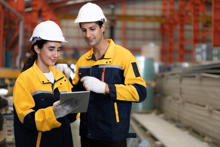 Hispanic,Industrial,Engineers,In,White,Helmet,And,Safety,Jacket,Work